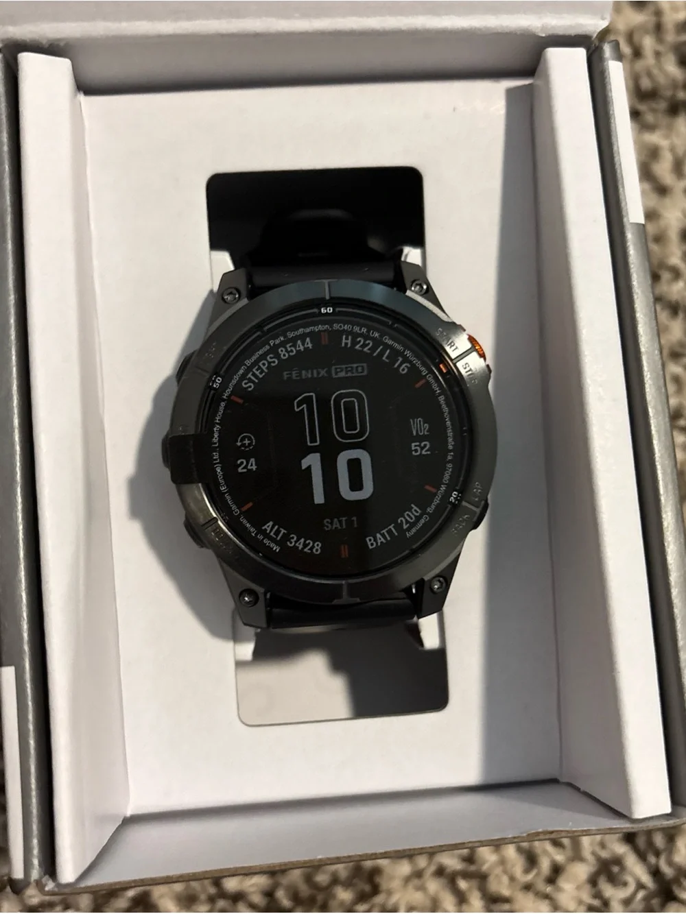 garmin fēnix 7 Pro Solar Edition — slate gray and black with orange accent